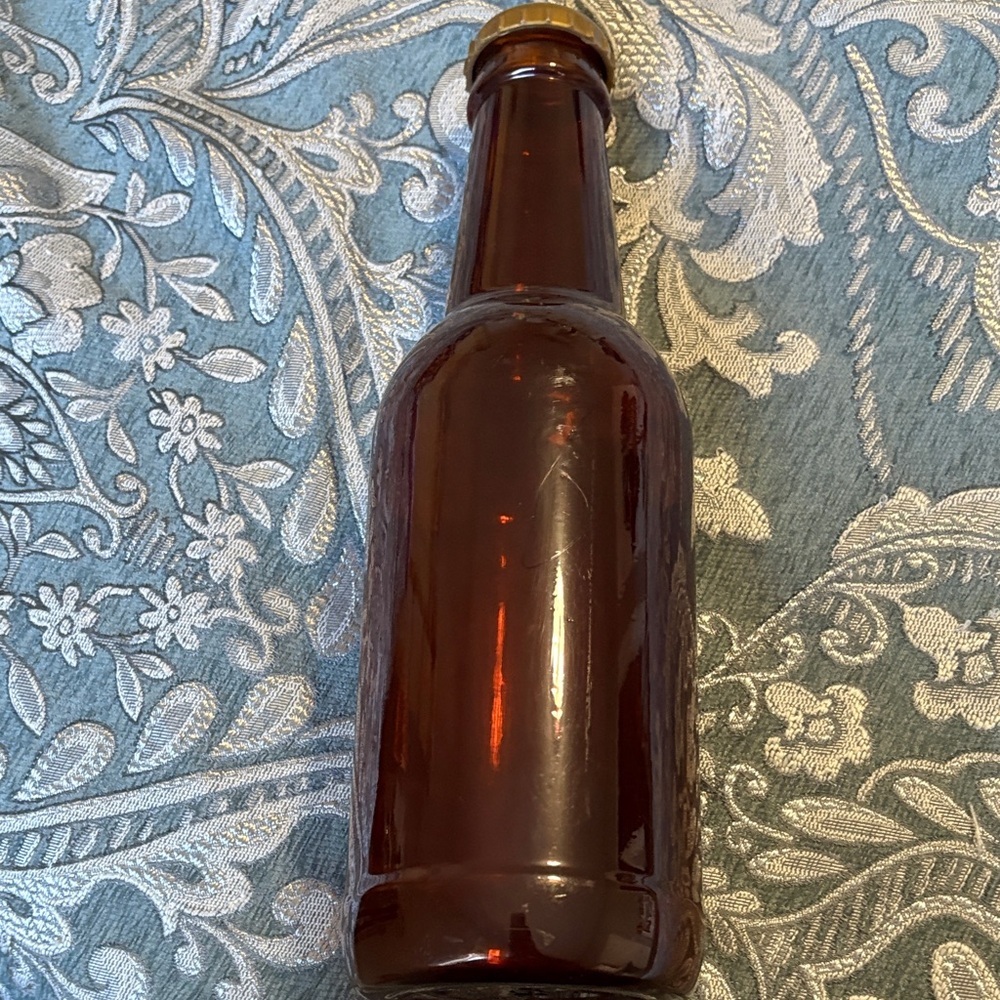 NHL Edmonton Oilers Brown Bottle with Gold Cap Coin Bank - Picture 3 of 7